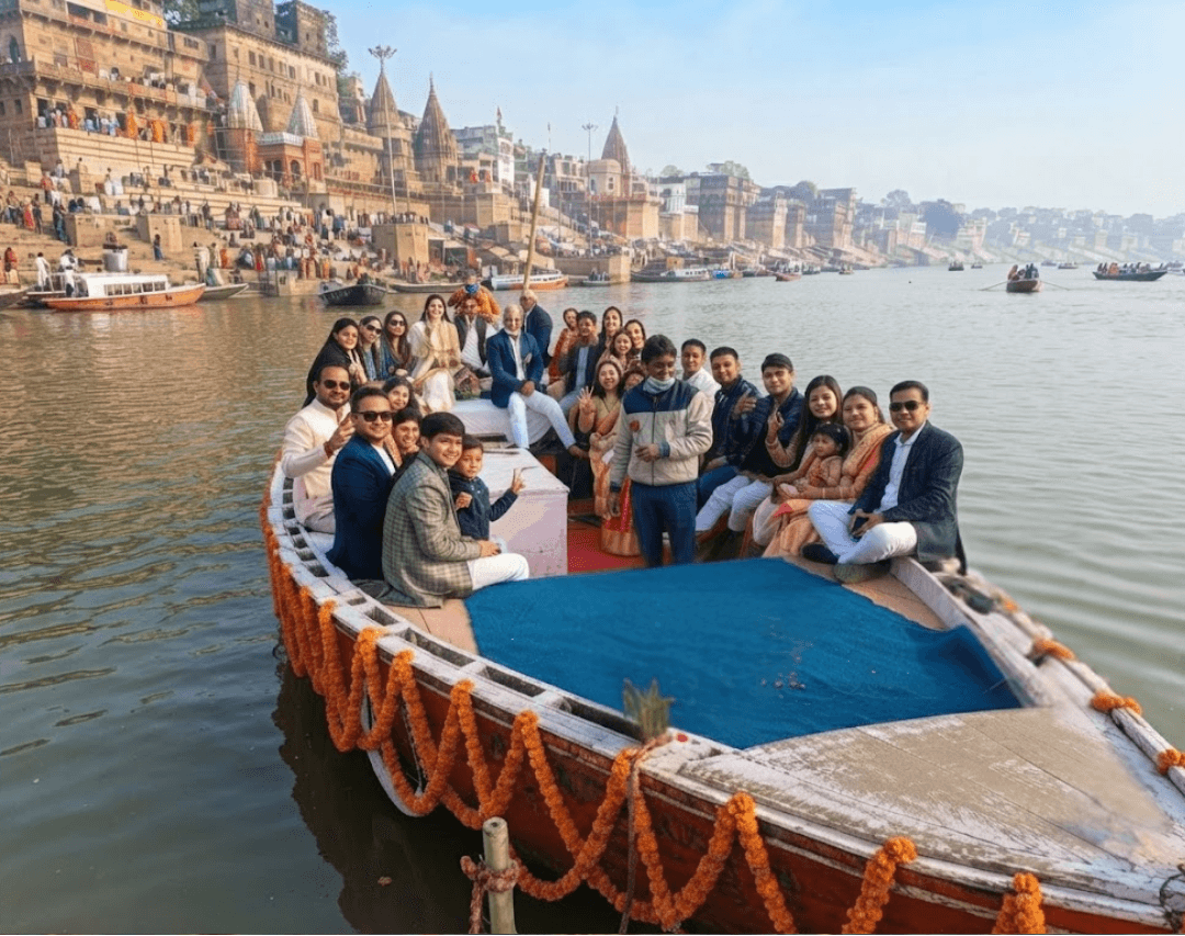 Motor boat full of guests cruising past ghats, daylight